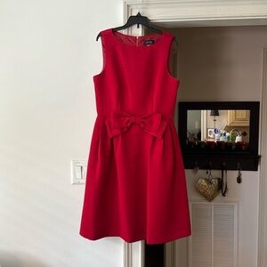 Tahari red sleeveless dress with bow and pockets . Worn once